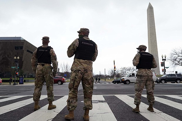Mayor Muriel Bowser on Jan. 11 urged Americans to avoid the city during President-elect Joe Biden's inauguration. Members of the DC National Guard are seen providing traffic control on Jan. 5.
Credit:	Jacquelyn Martin/AP