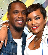Former Destiny's Child star LeToya Luckett (right) announces a split from her husband, Tommicus Walker (left). Pictured here, the couple attends an event Atlanta in July 2019.
Credit: Paras Griffin/Getty Images