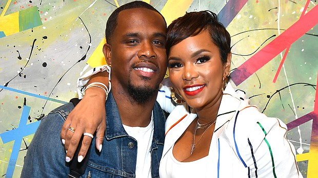 Former Destiny's Child star LeToya Luckett (right) announces a split from her husband, Tommicus Walker (left). Pictured here, the couple attends an event Atlanta in July 2019.
Credit:	Paras Griffin/Getty Images