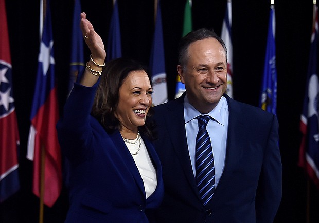 Vice President-elect Kamala Harris and her husband Douglas Emhoff, seen here in Wilmington, Delaware, on August 12, 2020, recall their first date: "It felt like we had known each other forever."
Credit:	OLIVIER DOULIERY/AFP/Getty Images