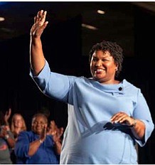 Stacey Abrams’ stark warning about Georgia’s new election bill being racist is shining a spotlight on a nationwide battle over …