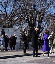 President Joe Biden and Vice President Kamala Harris place a wreath at the Tomb of the Unknown Soldier at Arlington National Cemetery as three former presidents and their wives look on. They are, from left, former President Barack Obama and his wife, Michelle; former President George W. Bush and his wife, Laura; and former President Bill Clinton and his wife, former Secretary of State Hillary Clinton.