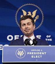 Former Democratic presidential candidate Pete Buttigieg speaks after he was nominated to be Transportation Secretary by President-elect Joe Biden on December 16, 2020 in Wilmington, Delaware. His confirmation hearing is on January 21.
Credit:	Kevin Lamarque-Pool/Getty Images