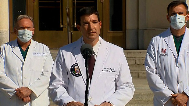 President Joe Biden has replaced the controversial White House physician who offered misleading information about President Donald Trump's coronavirus diagnosis last fall.
Credit:	Pool