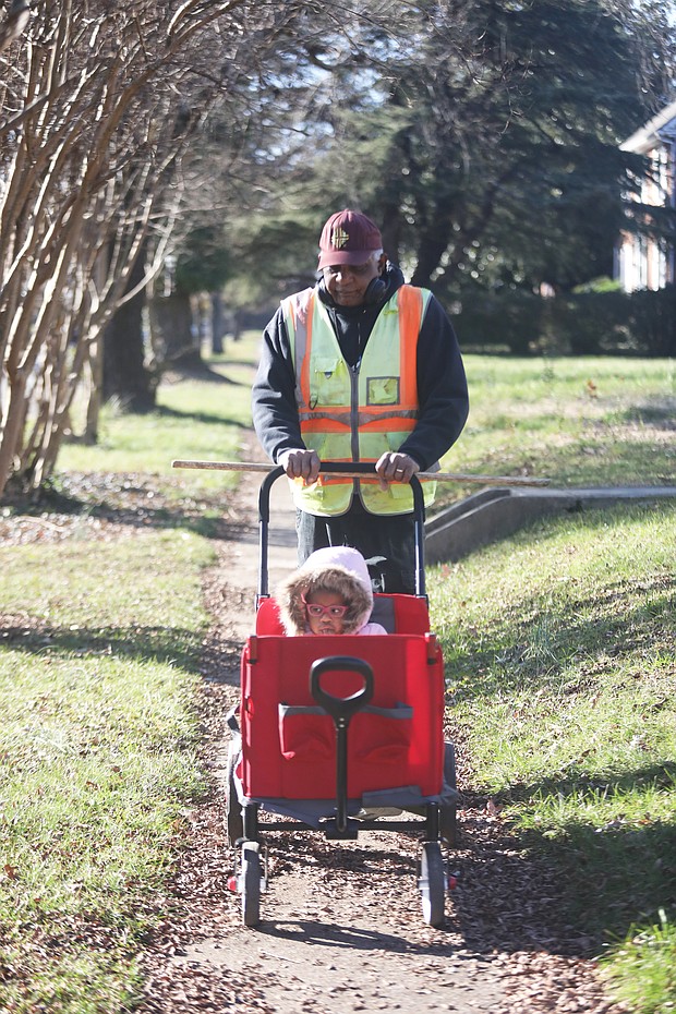 Recent days with warm sunshine made it perfect for an outdoor stroll for Harris Wheeler, aka “PaPa,” and his granddaughter Nia Rose Henderson, 2. The pair were enjoying a walk on DuBois Avenue in North Side.