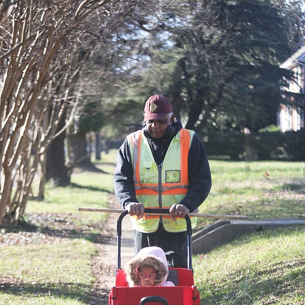 Recent days with warm sunshine made it perfect for an outdoor stroll for Harris Wheeler, aka “PaPa,” and his granddaughter Nia Rose Henderson, 2. The pair were enjoying a walk on DuBois Avenue in North Side.