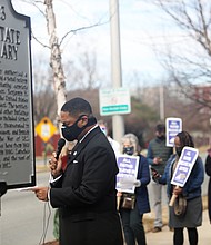 The Rev. Duane Hardy, pastor of Seven Pines Baptist Church in Sandston, leads a prayer during a vigil Jan. 22 near the site of the former Virginia State Penitentiary in Richmond seeking the abolition of the death penalty in the commonwealth. It was one of several vigils held around the state last week calling for the elimination of the death penalty.
