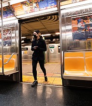 A pending order from the US Centers for Disease Control and Prevention is about to require masks on public transportation. Pictured is a person wearing a face mask while entering the subway on October 31, 2020 in New York City.
Credit:	Noam Galai/Getty Images