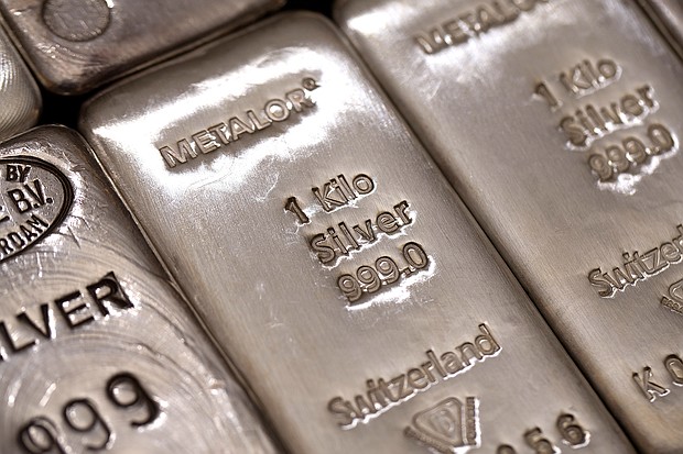 The hallmark details on one kilogram silver bars are seen at London bullion dealers Gold Investments Ltd. in this arranged photograph in London, U.K., on Thursday, April 4, 2013.
Credit:	Simon Dawson/Bloomberg/Getty Images