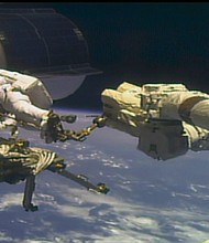 Astronauts Mike Hopkins and Victor Glover Jr. conducted their first spacewalk together on Wednesday, January 27.
Credit:	NASA