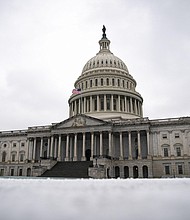 Snow covers the ground on the East Front of the U.S. Capitol in Washington, D.C., U.S., on Monday, Feb. 1, 2021.
Credit:	Al Drago/Bloomberg/Getty Images
