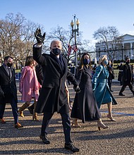 President Joe Biden, First Lady Jill Biden and family, walk in front of the White House during a Presidential Escort to the White House, Wednesday, Jan. 20, 2021 in Washington.
Credit:	Doug Mills/The New York Times/AP