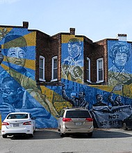 As Black History Month gets underway, this dramatic mural provides an artistic celebration of the people and events who represent protest, progress and achievement. Location: 504 W. Broad St. in Downtown. Richmond artists Ed Trask and Jason Ford created the mural, called “Voices of Perseverance,” as part of the Mending Walls RVA initiative. Launched by muralist Hamilton Glass, Mending Walls aims to bring together artists to develop projects that spark empathy and dialogue. Mr. Glass came up with the idea during the upheaval over racial justice and police misconduct that led to the removal of most of the city’s Confederate statues.