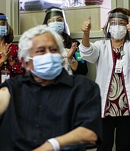 The news about the future of the Covid-19 crisis is really promising. This image shows Sharp HealthCare caregivers celebrating after patient Carlos Alegre received the Pfizer-BioNTech COVID-19 vaccine on December 21, 2020 in Chula Vista, California.
Credit:	Mario Tama/Getty Images