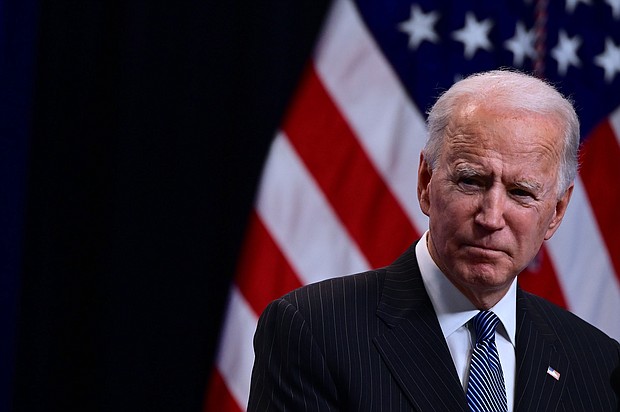 US President Joe Biden answers questions from the media after signing a "Made in America" Executive Order in the South Court Auditorium at the White House on January 25, 2021 in Washington, DC.
Credit:	Jim Watson/AFP/Getty Images