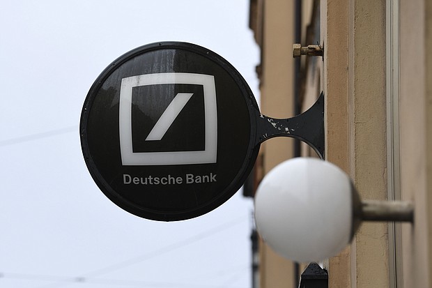 A logo outside a Deutsche Bank AG bank branch in Munich, Germany, on Wednesday, Feb. 3, 2021. Deutsche Bank is scheduled to report fourth-quarter earnings on Thursday.
Credit:	Andreas Gebert/Bloomberg/Getty Images