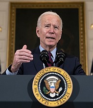 U.S. President Joe Biden delivers remarks on the national economy and the need for his administration's proposed $1.9 trillion coronavirus relief legislation in the State Dining Room at the White House on February 05, 2021 in Washington, DC.
Credit: Stefani Reynolds/Pool/Getty Images