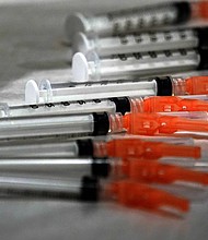 These are syringes loaded with the Moderna COVID-19 Vaccine, during a vaccination clinic hosted by the University of Pittsburgh and the Allegheny County Health Department at the Petersen Events Center, in Pittsburgh, Thursday, Jan. 28, 2021.
Credit: Gene J. Puskar/AP