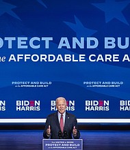 The Biden administration asks the Supreme Court to save Obamacare. In this image, President Joe Biden delivers remarks about the Affordable Care Act and Covid-19 at The Queen theater on October 28, 2020 in Wilmington, Delaware.
Credit:	Drew Angerer/Getty Images