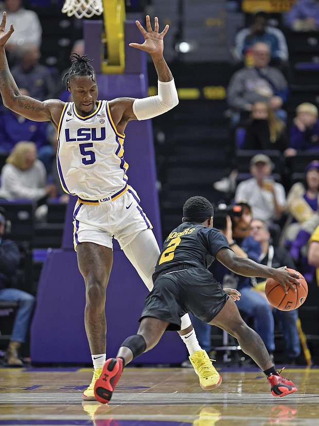 Darnell Rogers moves the ball down the court.