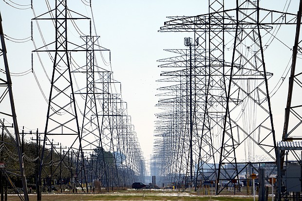 This photo shows power lines in Houston, Texas on Tuesday, Feb. 16. After the state's winter storm, some residents must change electric providers while others still don't have water.
Credit:	David J. Phillip/AP