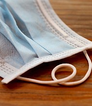 Surgical masks were best for communicating in louder environments, the study found.
Credit:	Shutterstock