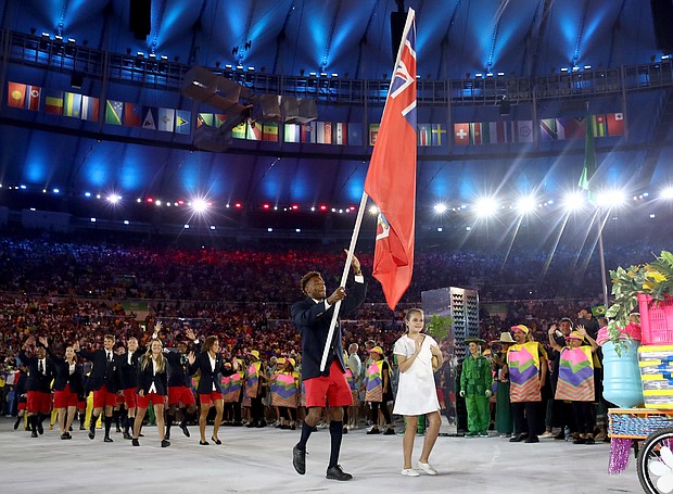 Tyrone Smith carries the flag for Bermuda during the opening ceremony of the Rio 2016 Olympics.
Credit:	Cameron Spencer/Getty Images