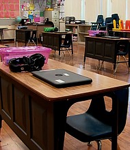 An empty classroom awaits the return of students in Glendale, California.
Credit:	CNN