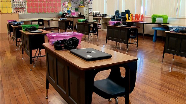 An empty classroom awaits the return of students in Glendale, California.
Credit:	CNN