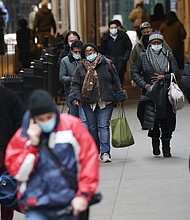 Americans have received some good news lately about the coronavirus. But that doesn't mean we're in the clear yet, experts warn.
Credit: John Angelillo/UPI/Shutterstock