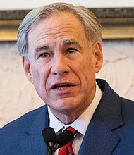 Abbott announced that he is rescinding executive orders that limit capacities for businesses and the state-wide mask mandate.
Credit:	Justin Rex/AP