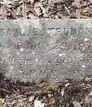The small marker rests at the grave of Samuel Truman, grandson of Abraham Truman, who bought the land to farm following the Civil War. Samuel Truman died at age 28 from typhoid fever, according to records.