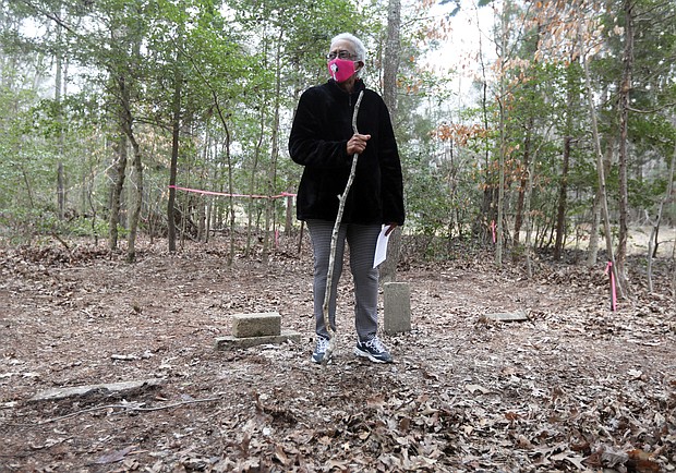 Carolyn Bradford Moten stands among the headstones in an unmarked cemetery that was found on land off Long Bridge Road in Eastern Henrico County that is now owned by the Capitol Region Land Conservancy.
The land was purchased in 1874 by Abraham Truman and stayed in the Truman family until 1979. Ms. Moten is his great-niece.