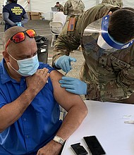 Guillermo Muñoz getting the J&J Covid-19 vaccine.
Credit:	Rosa Flores/CNN