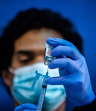 The United States is holding firm to the strategy to administer two doses of the Moderna and Pfizer/BioNTech Covid-19 vaccines a few weeks apart. Still, the idea of expanding the supply by dispensing only one dose hasn't faded away.
Credit:	APU GOMES/AFP/AFP via Getty Images