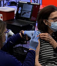 Barbara Schmalenberger is the first person to get the Johnson & Johnson vaccine after it was authorized.
Credit:	CNN