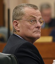 Following widespread power outages during a series of winter storms that left many Texas residents in the dark for days, the head of the organization overseeing the state's power grid, Bill Magnes has been fired.
Credit:	Eric Gay/AP