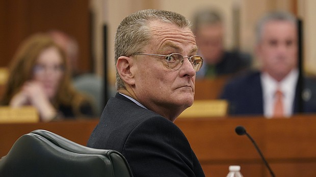 Following widespread power outages during a series of winter storms that left many Texas residents in the dark for days, the head of the organization overseeing the state's power grid, Bill Magnes has been fired.
Credit:	Eric Gay/AP