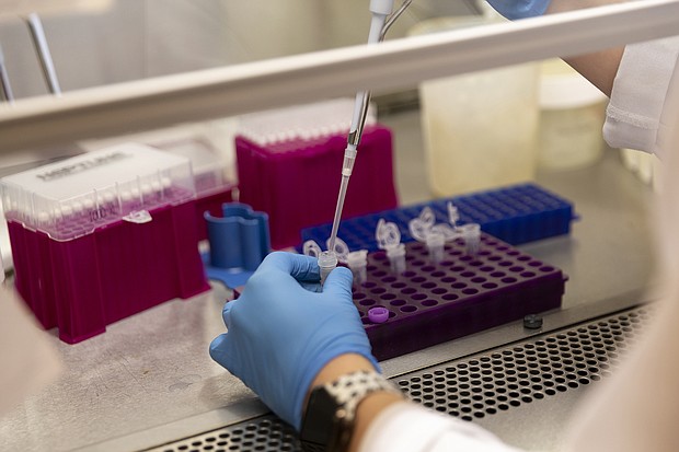 Coronavirus case declines have stopped and infection numbers plateaued at very high levels -- with the US averaging roughly 60,000 new cases daily since the beginning of March..
Credit:	Cheney Orr/Bloomberg/Getty Images