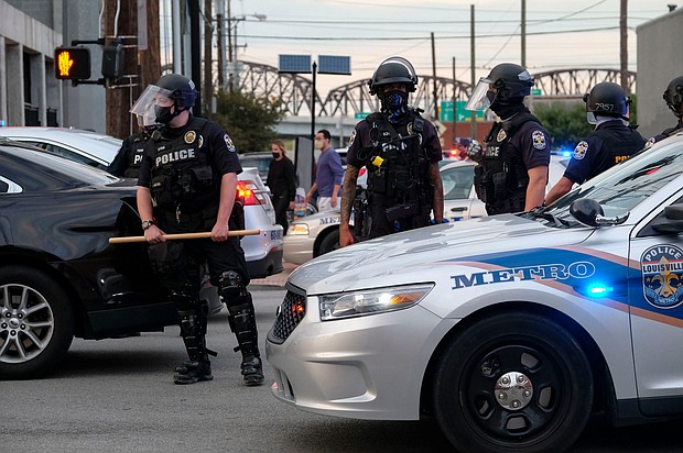 Kentucky state lawmakers have advanced a bill that would make it a crime to insult or taunt a law enforcement officer in a way that could provoke a violent response.
Credit:	Jeff Dean/AFP/Getty Images