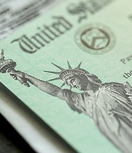 Some financially struggling Americans who owe back taxes will miss out on stimulus payments unless the Internal Revenue Service decides to change its rules. Part of the problem is the IRS didn't have their correct information on file.
Credit:	Shutterstock