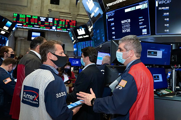 The Dow surged more than 600 points on March 8, as investors cheered the Senate's passage of a Covid-19 relief package that aims to bolster the US economy.
Credit:	Nicole Pereira/New York Stock Exchange/AP