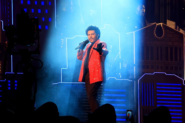 Singer The Weeknd, performs here for Super Bowl February 07, in Florida is the latest chart-topping Black performer to be snubbed by the Grammys.
Credit:	Mike Ehrmann/Getty Images