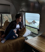 Nicole Maddox sits with her dog, Stanley, in her Airstream trailer in Rancho Palos Verdes, California. Maddox retrofitted the trailer so she is able to work remotely from anywhere in the country.
Credit:	Heather Fulbright/CNN