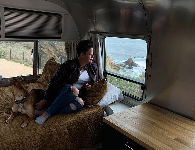 Nicole Maddox sits with her dog, Stanley, in her Airstream trailer in Rancho Palos Verdes, California. Maddox retrofitted the trailer so she is able to work remotely from anywhere in the country.
Credit:	Heather Fulbright/CNN