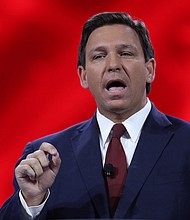 After a year of criticism by health experts, mockery from comedians and blistering critiques from political rivals, Florida Gov. Ron DeSantis is standing unabashedly tall among the nation's governors on the front lines of the coronavirus fight.
Credit:	Joe Raedle/Getty Images