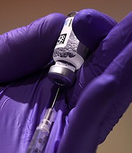 Experts say there's a tough race between Covid-19 vaccinations and a contagious variant that's rapidly spreading across the US, threatening another dangerous surge -- and the eased restrictions only further complicate things.
Credit:	Alex Wong/Getty Images