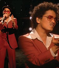 In this video grab provided by CBS and the Recording Academy, Anderson .Paak, left, and Bruno Mars, together as Silk Sonic, perform “Leave The Door Open.”