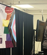 Luise “Cheezi” Farmer, board president of Diversity Richmond, announces the merger of the two leading LGBTQ organizations in the Richmond region during a recent news conference.