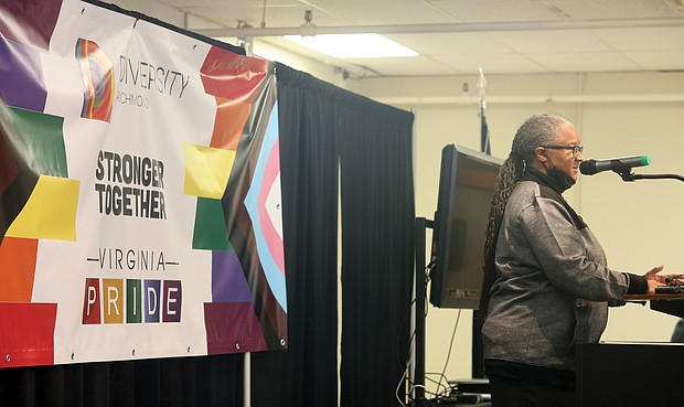 Luise “Cheezi” Farmer, board president of Diversity Richmond, announces the merger of the two leading LGBTQ organizations in the Richmond region during a recent news conference.